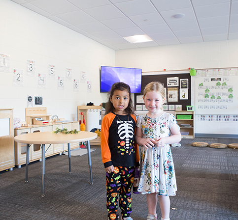 KHPS ECC Feature3 060223 two female students smiling at the camera
